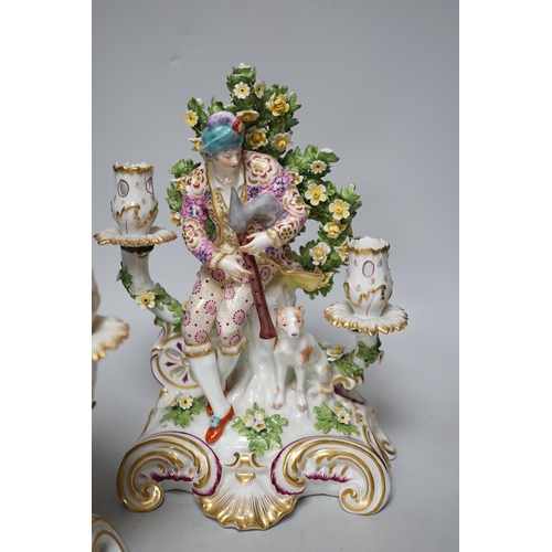 251 - A pair of French porcelain two branch figural candlesticks in the form of musicians, largest 29cm hi... 