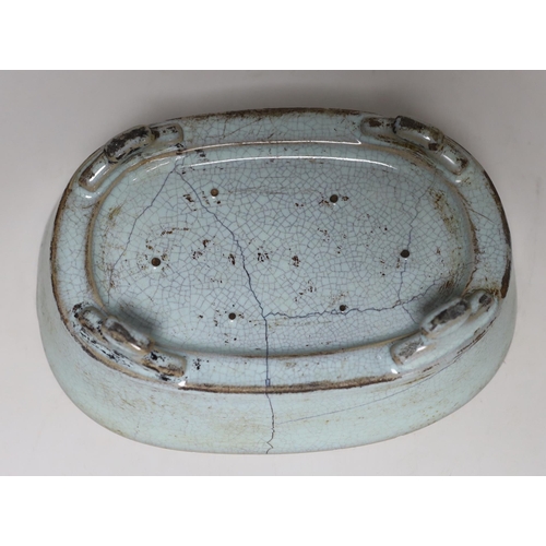 263 - A Chinese celadon crackle glazed oval dish, 23cm wide