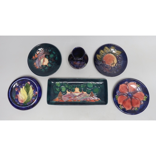 266 - Four Moorcroft small circular dishes, a rectangular dish, and a small vase (6)