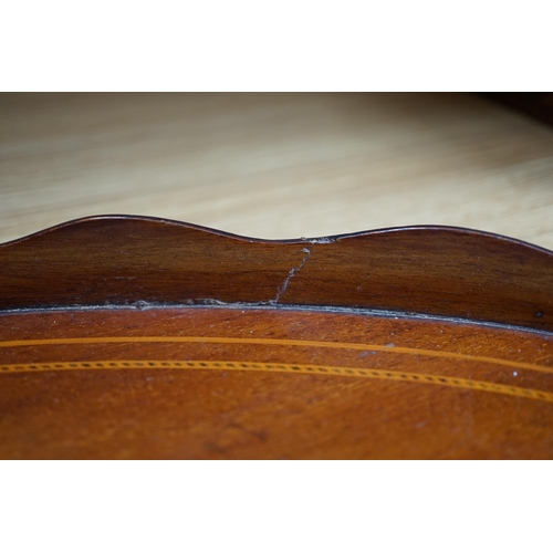 277 - An Edwardian marquetry inlaid oval mahogany two handled tea tray, 63cm