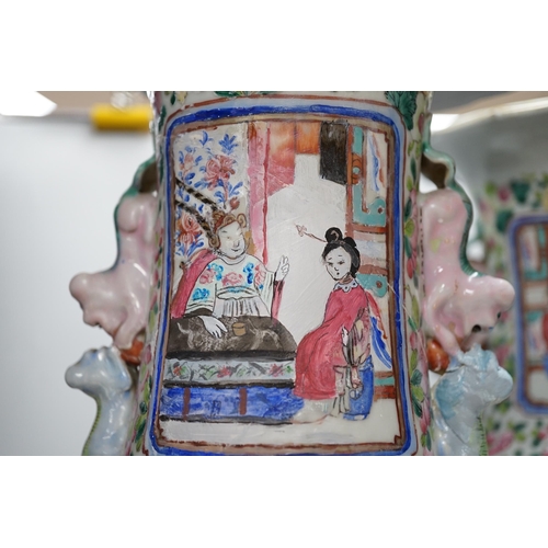 285 - A pair of large Chinese porcelain famille rose vases, 19th century,  decorated with court scenes and... 