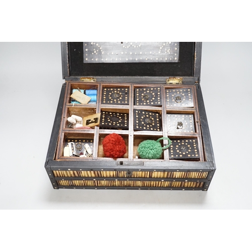 287 - A 19th Century Ceylonese ebony, porcupine quill and bone inlaid sewing box with contents including c... 