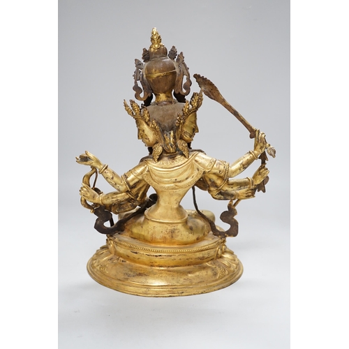 288 - A Sino Tibetan gilt bronze figure of Avalokiteshvara, 34cm high