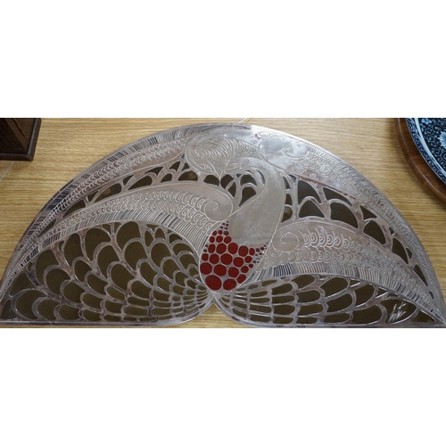 294 - After Erte. A decorative panel or stand, with stylised decoration, 62cm wide