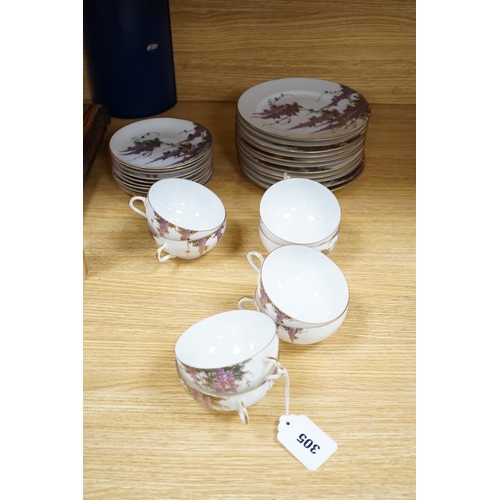 305 - A Japanese part tea service with wisteria decoration, comprising of eight cups, eleven saucers and t... 