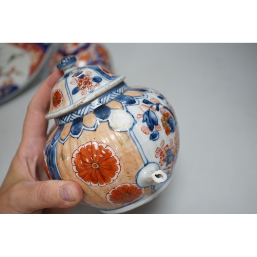 307 - Nine Japanese Imari pieces including; a charger, lidded pot, a bowl, four small gourd vases, two lid... 