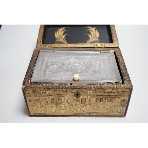 311 - A 19th century Chinese export lacquer tea caddy, black ground with gilt decoration, containing a sep... 