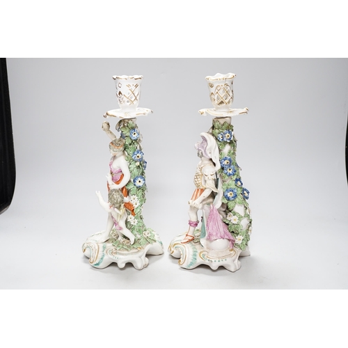 331 - A pair of 18th century Derby figural candlesticks, 29cm