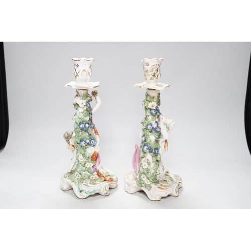 331 - A pair of 18th century Derby figural candlesticks, 29cm