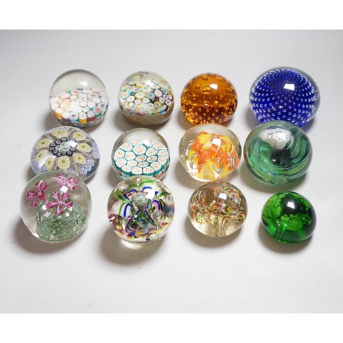 340 - Twelve 20th century paperweights including Bohemian and Chinese examples, close packed millefleur ca... 