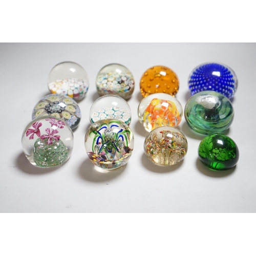 340 - Twelve 20th century paperweights including Bohemian and Chinese examples, close packed millefleur ca... 