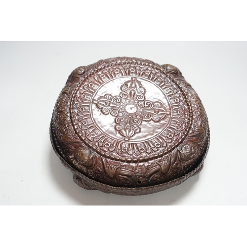 354 - A Tibetan repousse work copper box and cover, 19th century, 22cm