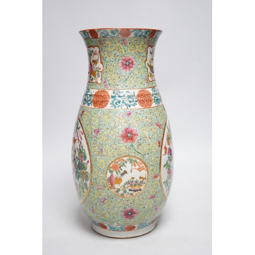 358 - A 19th century Chinese enamelled porcelain vase on a green ground, 36.5cm