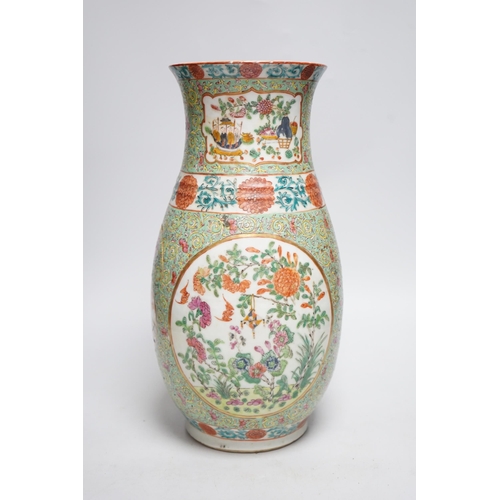 358 - A 19th century Chinese enamelled porcelain vase on a green ground, 36.5cm