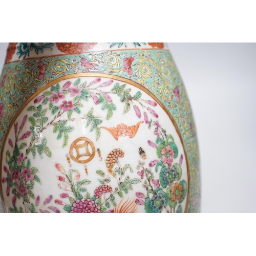 358 - A 19th century Chinese enamelled porcelain vase on a green ground, 36.5cm