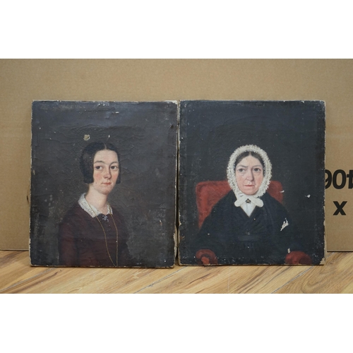 670 - 19th century English School, pair of oils on canvas, portraits of two ladies wearing mid Victorian d... 