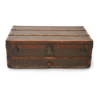 A 1940's Goyard vanity case with matching suitcase, each with tan leather  mounts, the vanity case wi