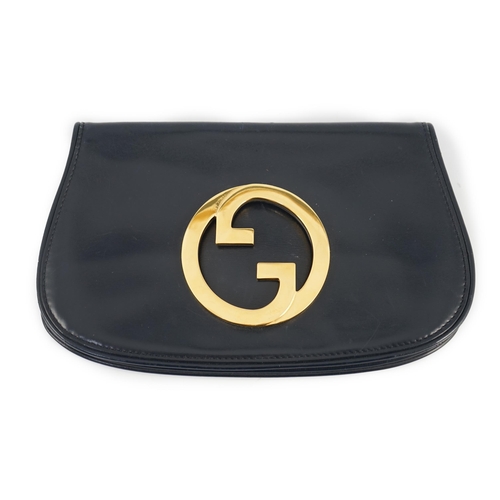 A vintage Gucci Blondie Unicorn navy leather clutch bag Gold