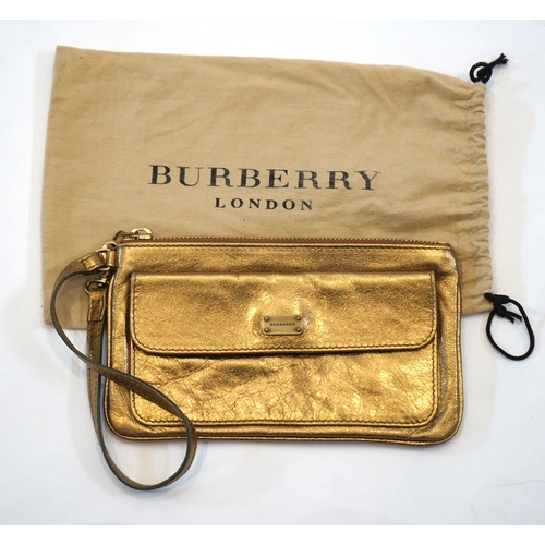 Burberry store gold clutch