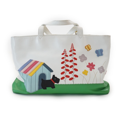 A Radley white Radley s Garden leather grab bag 2004 with Scottie dog kennel and flowers design