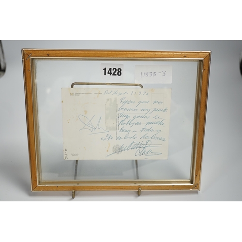 1428 - A  framed Salvador Dali postcard signed with his autograph on reverse,