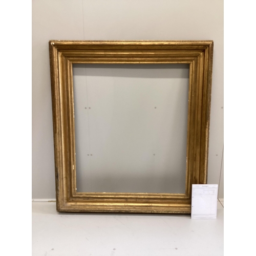 10 - A large 19th century rectangular giltwood and composition picture frame, width 130cm, height 144cm... 