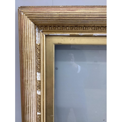 14 - A large 19th century rectangular giltwood and composition picture frame, width 84cm, height 166cm... 