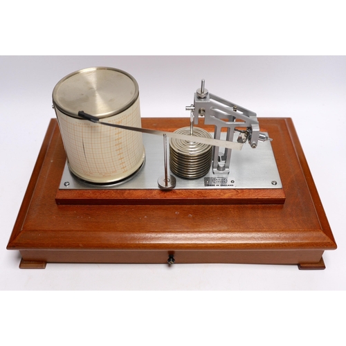 257 - A modern 1980s barograph by Casella in a teak case with bevelled glass panels and incorporating a dr... 