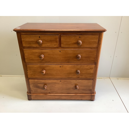 26 - A Victorian mahogany chest of two short and three long drawers, fitted with turned mahogany handles,... 