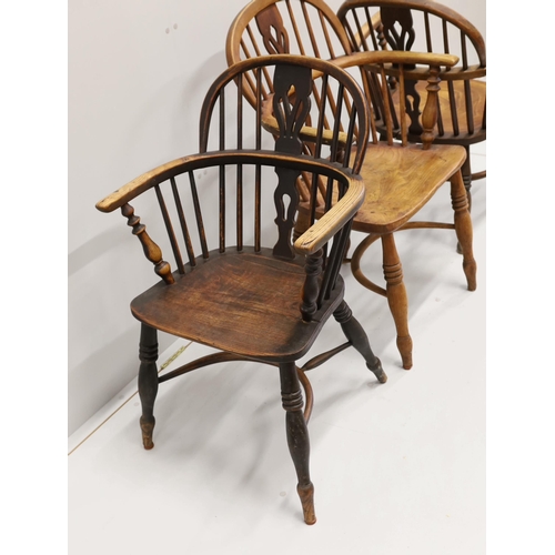 28 - Three 19th century Nottingham area Windsor ash and elm elbow chairs with crinoline stretchers, large... 