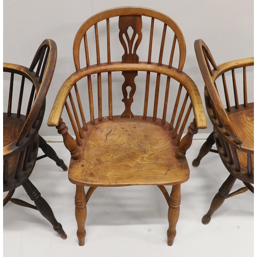 28 - Three 19th century Nottingham area Windsor ash and elm elbow chairs with crinoline stretchers, large... 