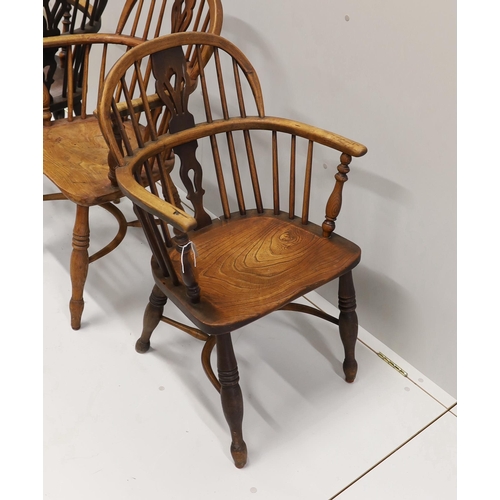 28 - Three 19th century Nottingham area Windsor ash and elm elbow chairs with crinoline stretchers, large... 