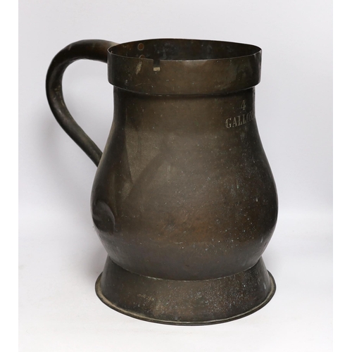 286 - A 19th century large 4 gallon copper measuring jug, 38.5cm high