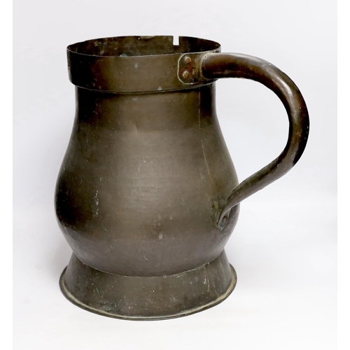 286 - A 19th century large 4 gallon copper measuring jug, 38.5cm high