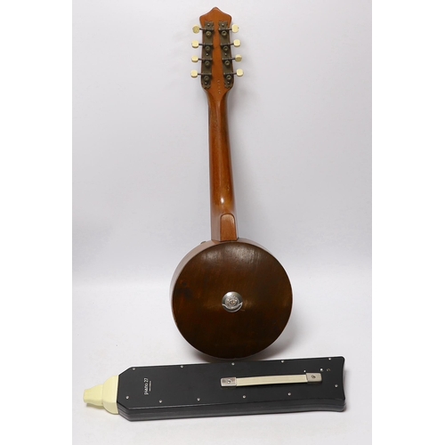 305 - A John Grey and sons, London eight string banjolele in original case and a Hohner melodica