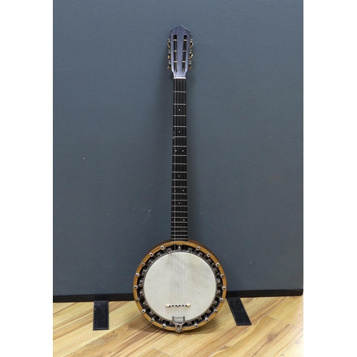 311 - A six string banjo, unmarked, in a hard case by Ashbury