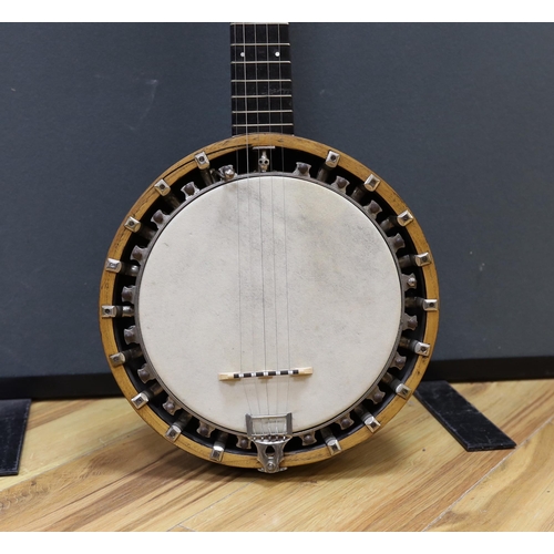 311 - A six string banjo, unmarked, in a hard case by Ashbury