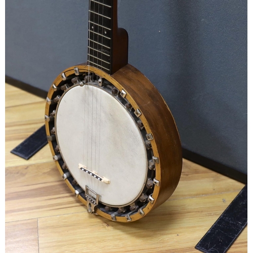 311 - A six string banjo, unmarked, in a hard case by Ashbury