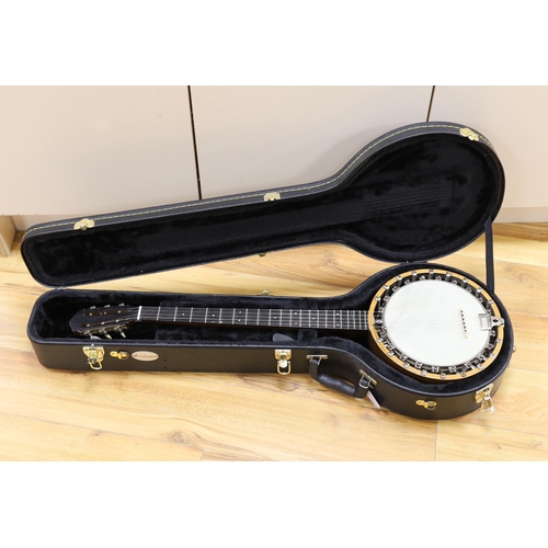 311 - A six string banjo, unmarked, in a hard case by Ashbury