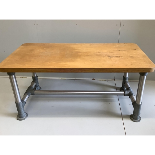 37 - Wolff Olins. An industrial style rectangular table, circa 1970, width 150cm, depth 75cm, height 69cm... 