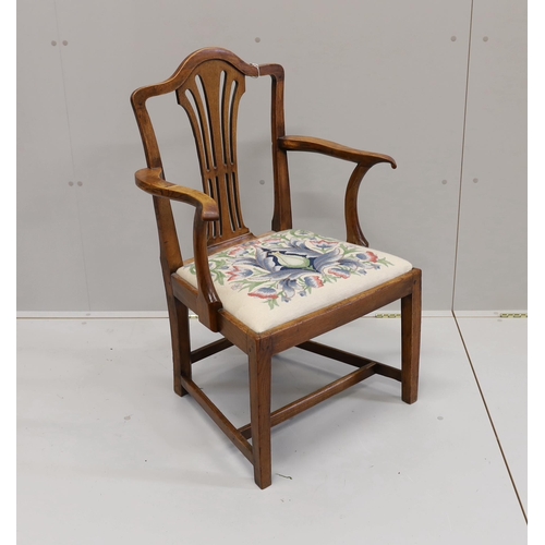 41 - A George III provincial elm elbow chair, width 58cm, depth 45cm, height 94cm