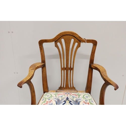 41 - A George III provincial elm elbow chair, width 58cm, depth 45cm, height 94cm