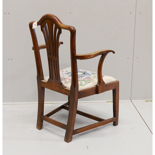 41 - A George III provincial elm elbow chair, width 58cm, depth 45cm, height 94cm