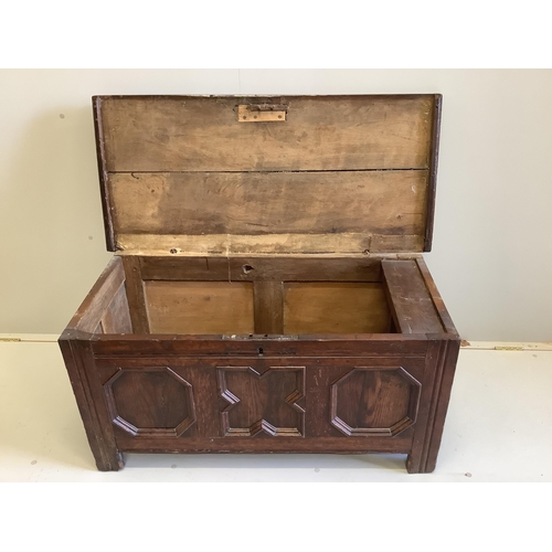 42 - A small 17th century oak coffer with moulded geometric panelled front, width 108cm, depth 49cm, heig... 