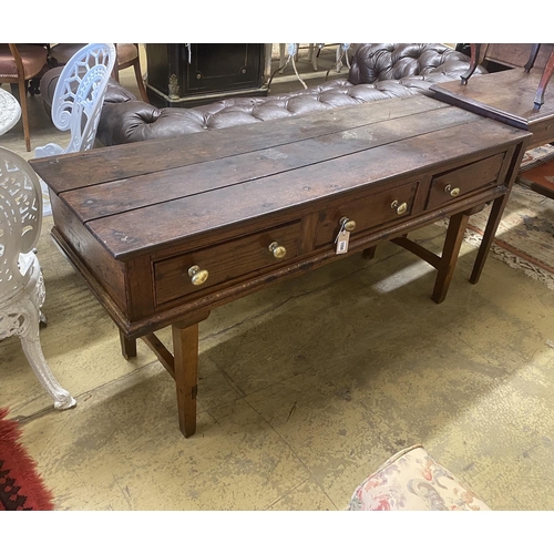 44 - An 18th century oak low dresser on later square tapered legs, width 150cm, depth 50cm, height 70cm... 