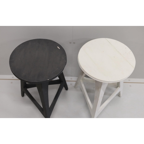 47 - A pair of contemporary circular painted cricket tables, diameter 35cm, height 60cm