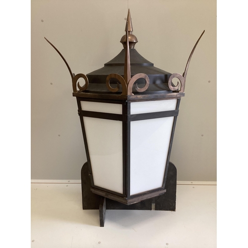 5 - A large Victorian style copper mounted tin wall lantern, width 85cm, depth 39cm, height approx. 130c... 