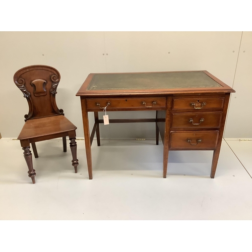 54 - An early 20th century mahogany and beech four drawer kneehole writing desk, width 107cm, depth 60cm,... 