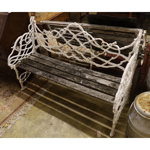 70 - A Victorian Coalbrookdale design painted cast iron garden bench, length 138cm, depth 55cm, height 86... 