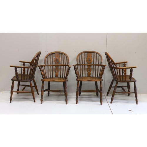 72 - A near set of four 19th century Nottingham area elm, ash and beech Windsor elbow chairs, possibly by... 